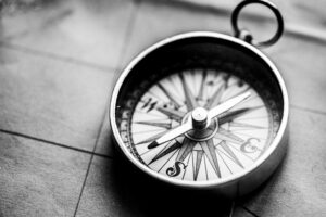 Compass resting on a map, representing strategic direction and navigation