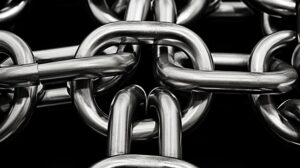 Interlocked steel chain links symbolising strength and connection
